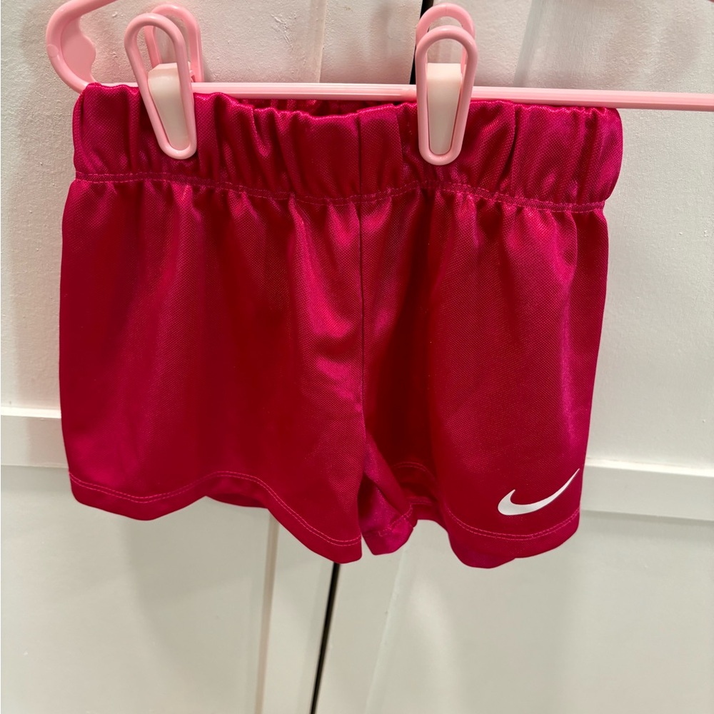 Nike Fuchsia color shorts, size 6 pre loved in great condition